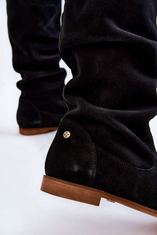 Seemisnakhsed pika säärega saapad... Seemisnakhsed pika säärega saapad...