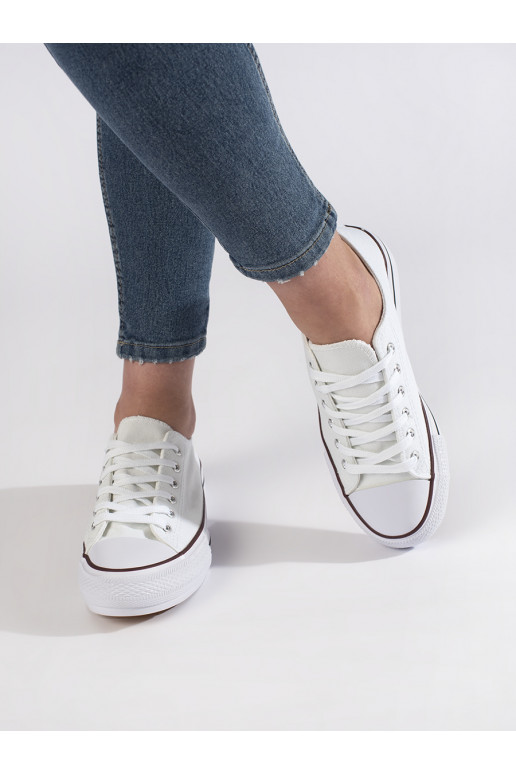 Valged klassikalise mudeli naiste tossud platvormiga Valged klassikalise mudeli naiste tossud platvormiga