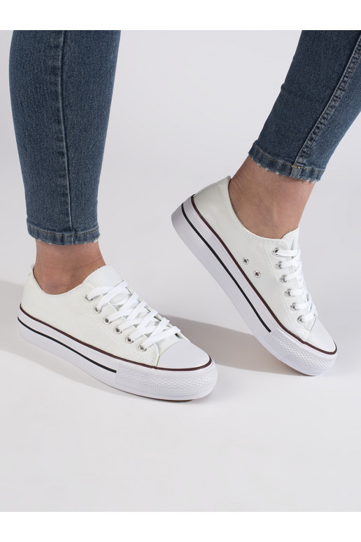 Valged klassikalise mudeli naiste tossud platvormiga Valged klassikalise mudeli naiste tossud platvormiga