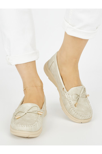 Kuldset värvi  mokassiinid ökonahast