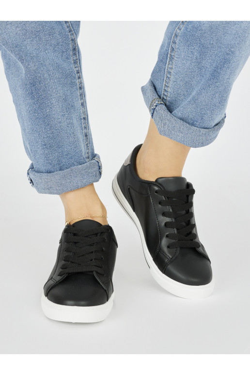   naiste kingad Mustad