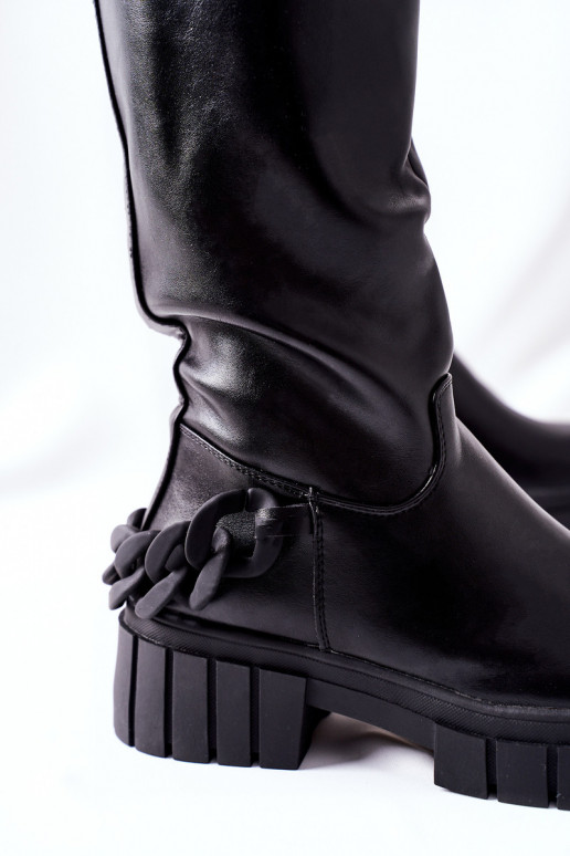 Mustad pikad saapad kettidega Teardown Mustad pikad saapad kettidega Teardown