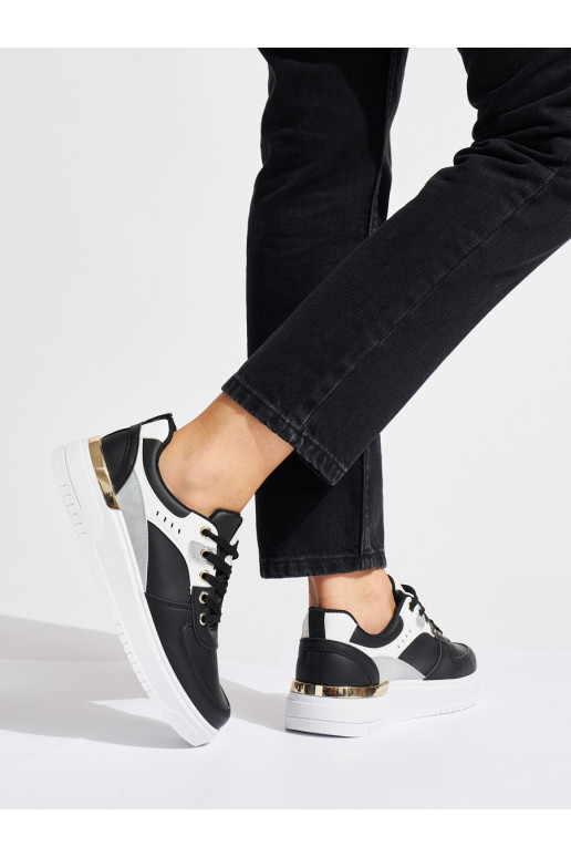 Must naiste kingad platvormiga