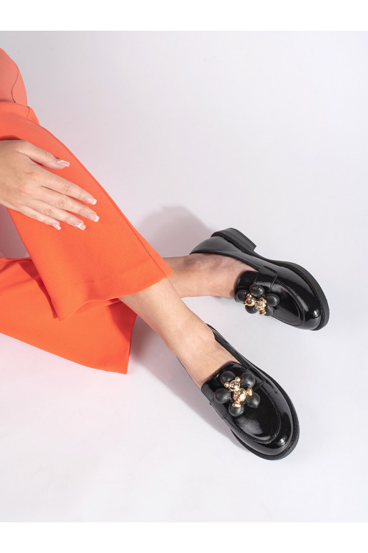 Must  naiste mokassiinid kaisukarudega