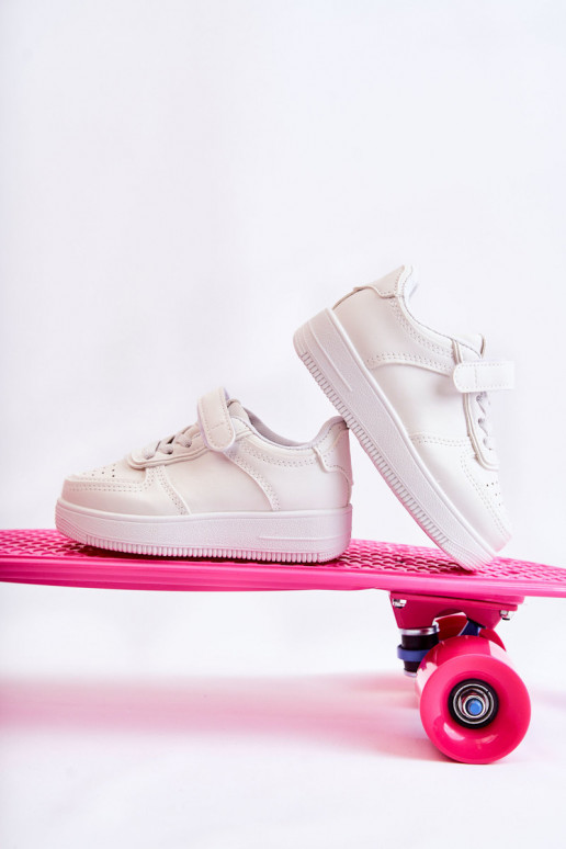 Laste jalanõud spordijalatsid krõpsudega kinnitatav valget värvi Elike Laste jalanõud spordijalatsid krõpsudega kinnitatav valget värvi Elike