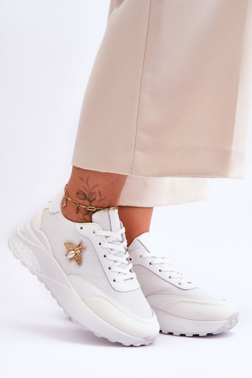 Läikivad jalatsid sportlikud jalatsid kaunistustega valget värvi Seneca Läikivad jalatsid sportlikud jalatsid kaunistustega valget värvi Seneca