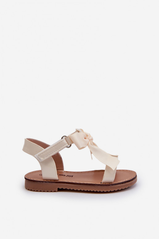 Lakitud sandaalid Laste jalanõud lipsukesega krõpsudega kinnitatav Elevandiluu värvi Joratia Lakitud sandaalid Laste jalanõud lipsukesega krõpsudega kinnitatav Elevandiluu värvi Joratia