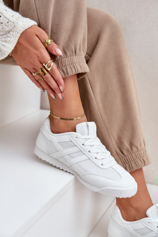 Spordijalatsid naiste saapad valget värvi Eezore  Spordijalatsid naiste saapad valget värvi Eezore