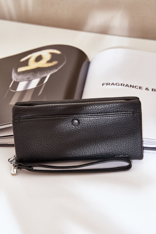 Rahakott Koos reljeefiga  Must Martiel