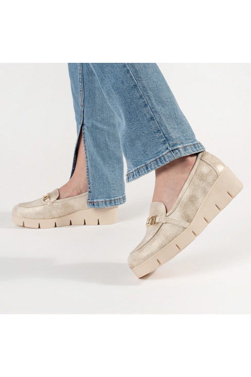 Kuldset värvi mokassiinid  