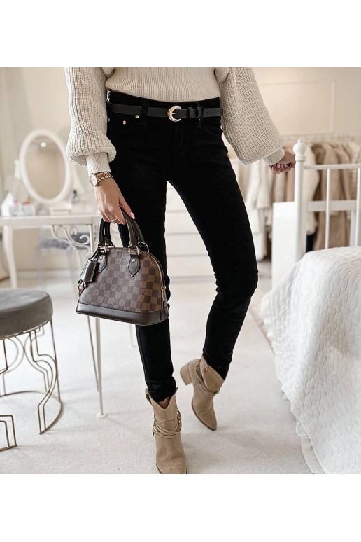 Mustast kangast püksid Sylvaini vööga