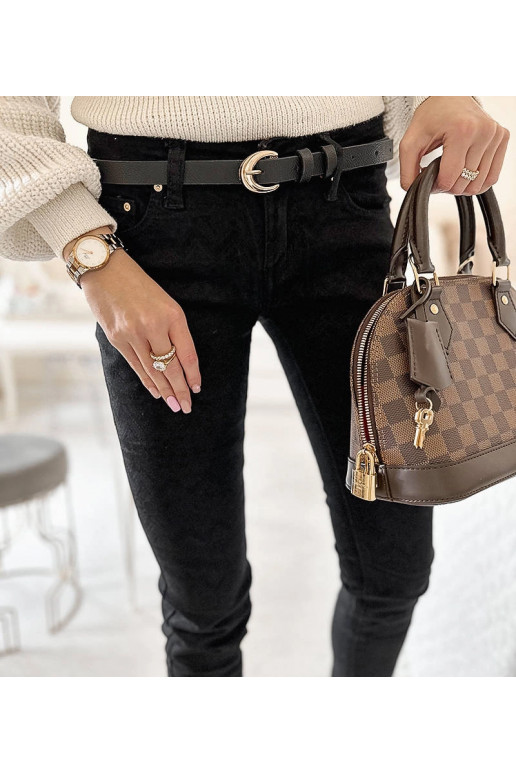 Mustast kangast püksid Sylvaini vööga