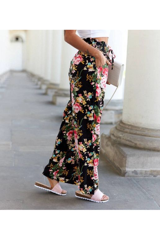 Cosimo mustad lillelised laia säärega...