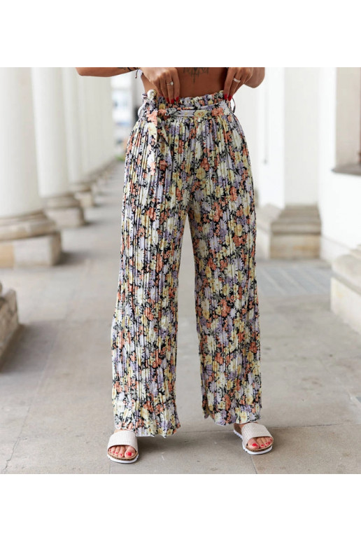 Mustad lillelised plisseeritud püksid...