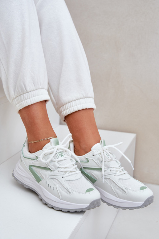 Noorte madalad sportlikud tossud kleepuvate kinnitustega valge värviga Dilan Noorte madalad sportlikud tossud kleepuvate kinnitustega valge värviga Dilan