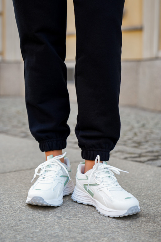 Noorte madalad sportlikud tossud kleepuvate kinnitustega valge värviga Dilan Noorte madalad sportlikud tossud kleepuvate kinnitustega valge värviga Dilan