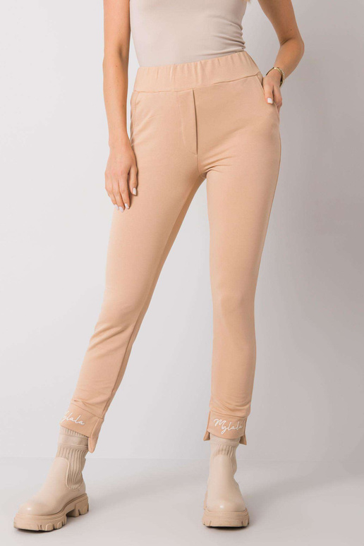 Kareni tikandiga beežid dressipüksid