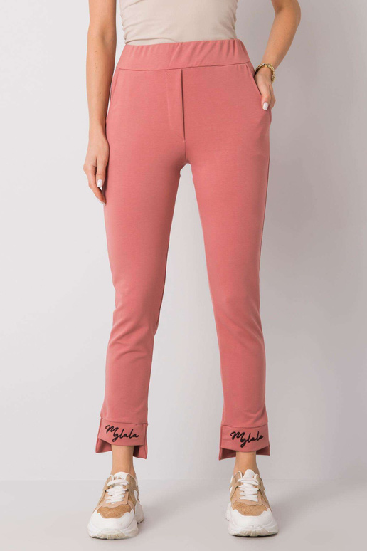 Määrdunud roosad dressipüksid Kareni...