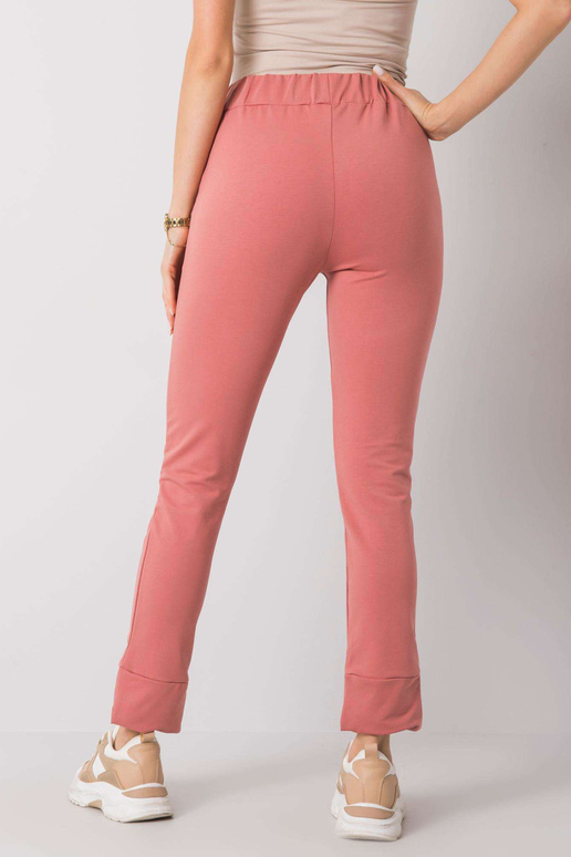 Määrdunud roosad dressipüksid Kareni...