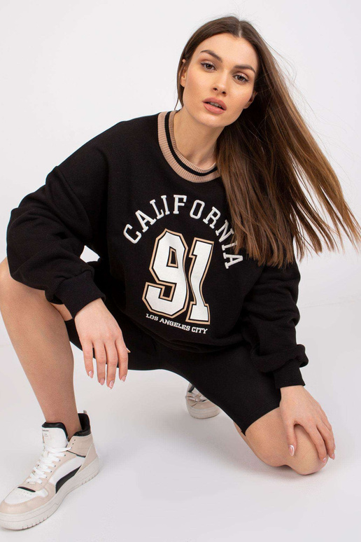 Must dressipluus tikandiga Suzanne