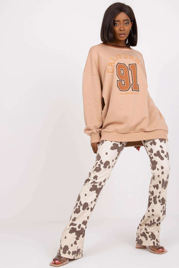 Beež pikk ilma kapuutsita...