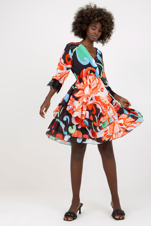 Musta ja oranži laineline volangidega...