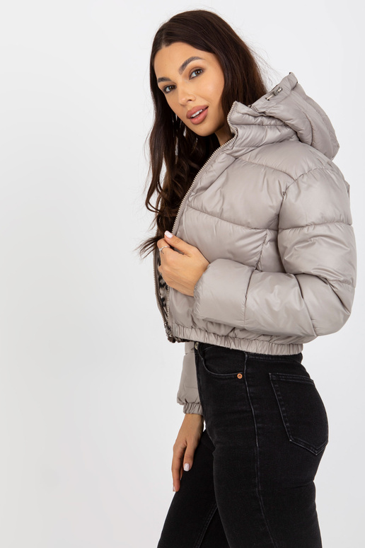 Beigefarbene doppelseitig gesteppte... Beigefarbene doppelseitig gesteppte...