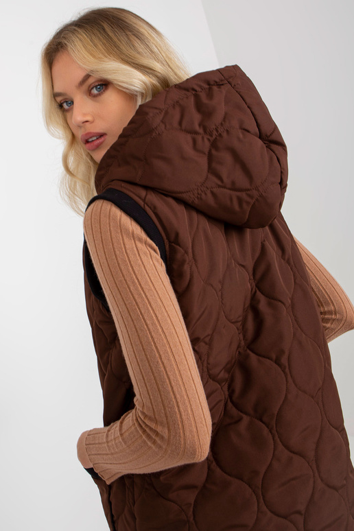 Tumepruun naiste tepitud vest... Tumepruun naiste tepitud vest...