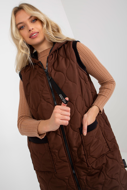 Tumepruun naiste tepitud vest... Tumepruun naiste tepitud vest...