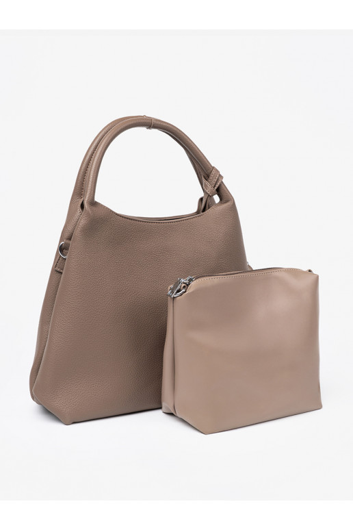   Käekott z kosmetyczką środku