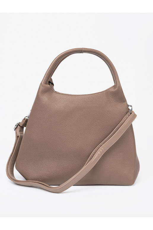   Käekott z kosmetyczką środku