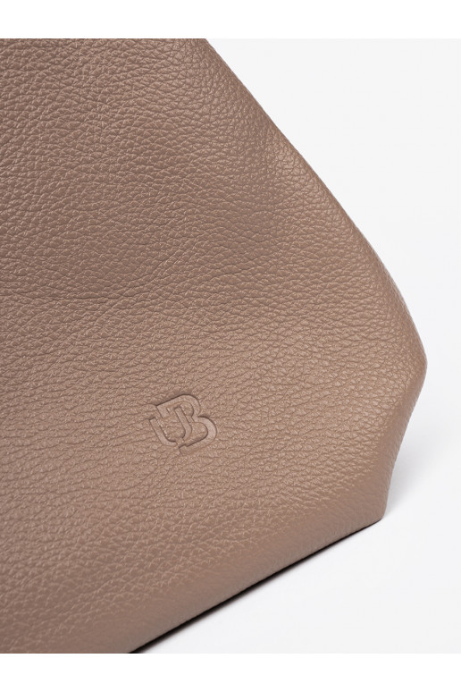   Käekott z kosmetyczką środku