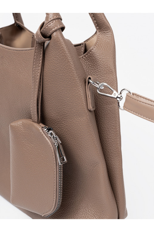   Käekott z kosmetyczką środku