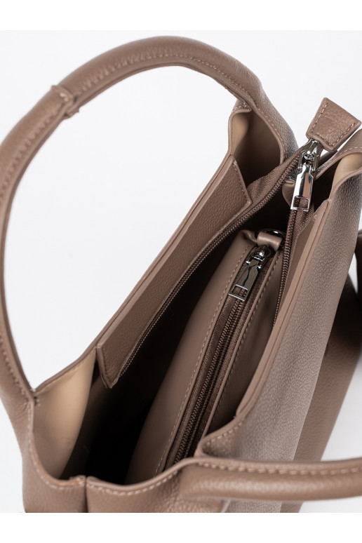   Käekott z kosmetyczką środku