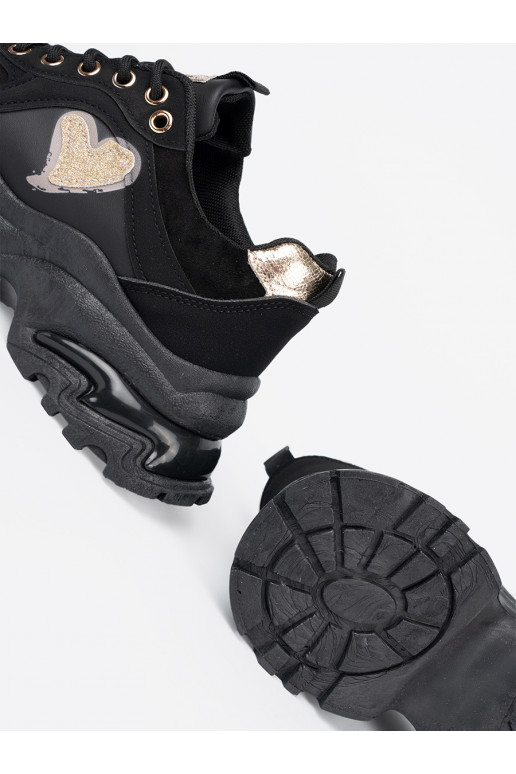 Must Naiste kingad z ozdobnym m m