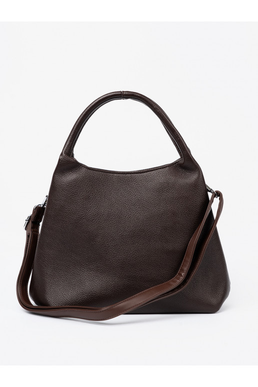   Käekott z kosmetyczką środku