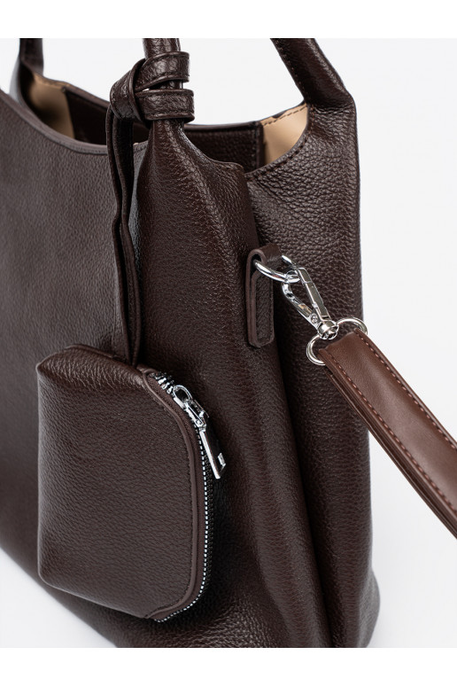   Käekott z kosmetyczką środku