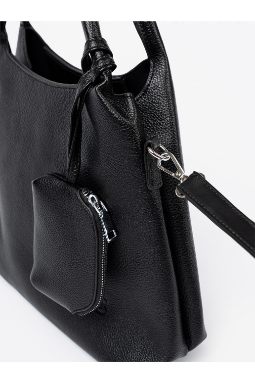   Käekott z kosmetyczką środku