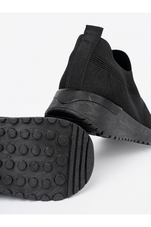 Spordistiilis kingad typu slip-on must värvm kolorze