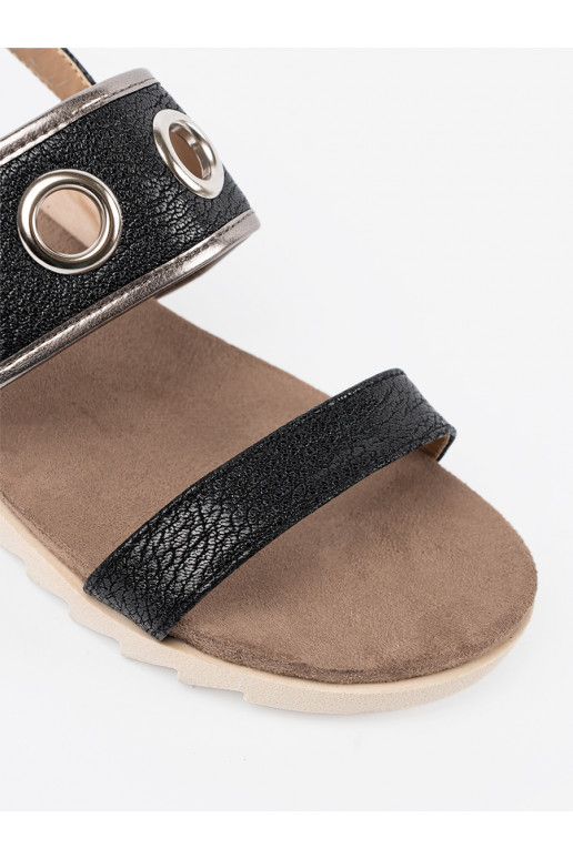 Must kingad z ozdobnymi metalowymi kółkami