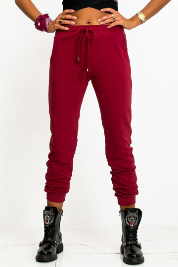 Tumepunased püksid Kiiremini