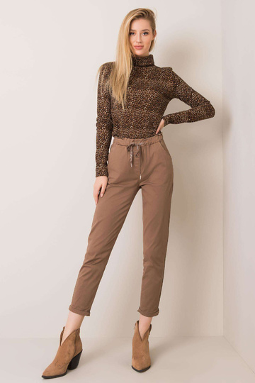 Carrie tumebeežid püksid 2