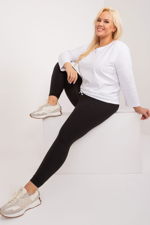 Valge pluss suuruses puuvillane pluus...