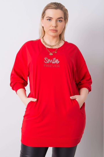 Punane pluss suuruses pluus...