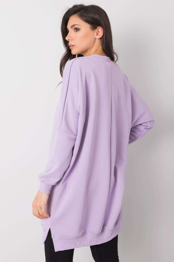 Helelilla tuunika kirjaga...