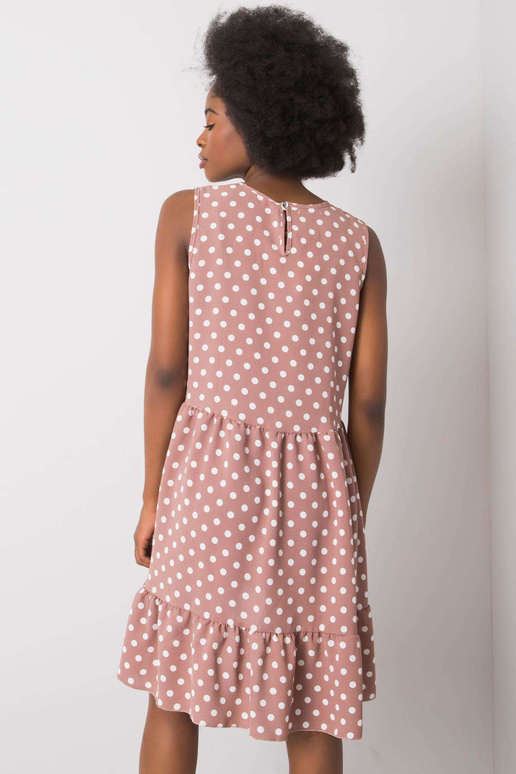 Määrdunud roosa täpiline kleit...