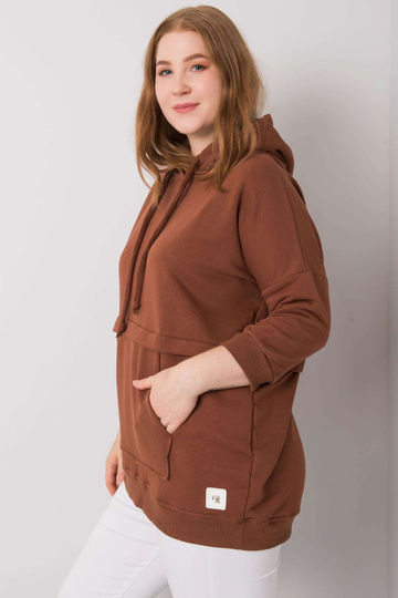 Tumepruun pluss suuruses...