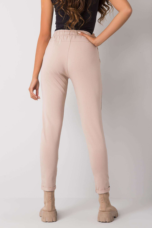 Beežid dressipüksid Haylee kirjadega