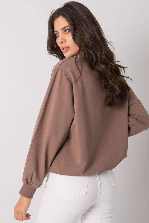 Pruun dressipluus kirjaga Ercolano...