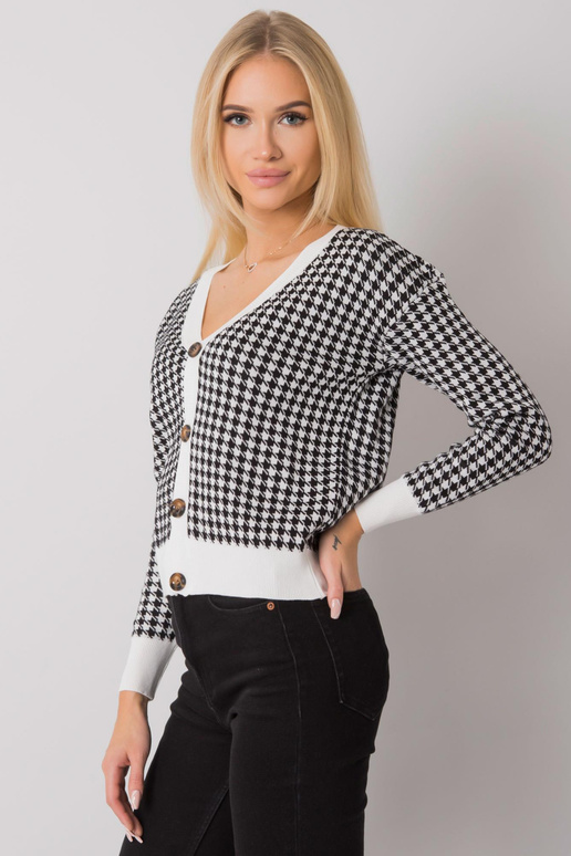 Valge ja must nööbitav kampsun...